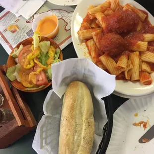 $5.50 for a generous portion of rigatoni and meatballs a side salad and a long hot roll and butter - pretty good!