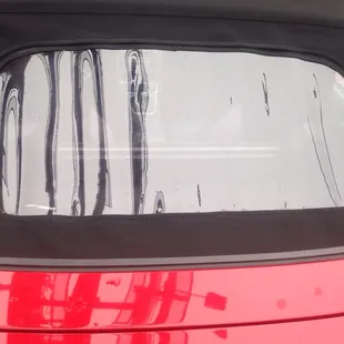 I broke the glass and he was able to replace it with a very inexpensive plastic sewn into its place.