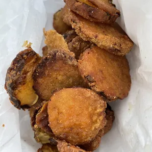 Fried Pickles: super crunchy like satisfying potato chips. Very flavorful, so bite into your burger first :)