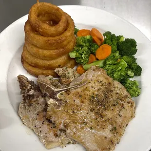 Pork Chops seasoned to perfection w/ Onion Rings &amp; Vegetables