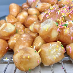Donut Holes. Soft, sugary glazed treats; freshly made and you almost never can stop with just eating one.