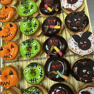 a variety of halloween donuts
