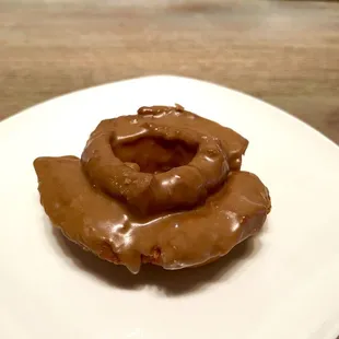 Chocolate Old Fashioned. Buttermilk cake donut with a chocolate glaze on top; crispy exterior and softly dense interior.