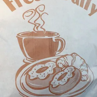 a bag of fresh daily donuts
