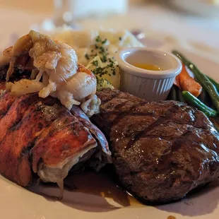 Surf and Turf:  6 oz. Petite Filet Mignon and 6 oz. Lobster Tail, Garlic Mashed Potatoes, Marchand d'Vin