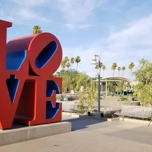 Robert Indiana's LOVE sculpture with Scottsdale founder Winfield Scott sculpture behind it