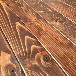 The hickory stain compliments the grain in our douglas fir tables.