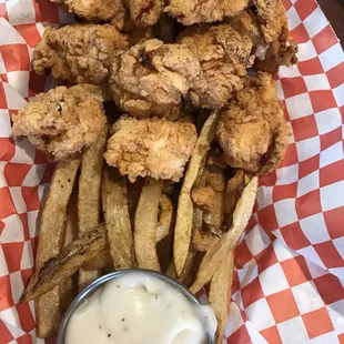 Hand breaded Chicken Bites and fresh cut fries!! With an awesome gravy