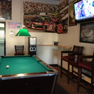 a pool table in a sports bar