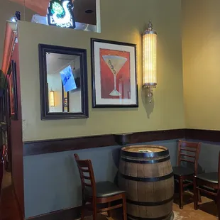 a bar with a wooden barrel