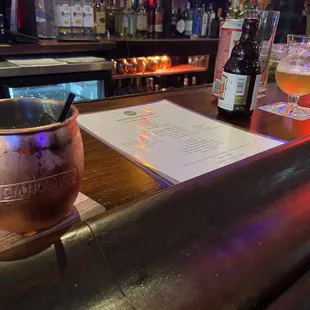 a copper mug on the bar