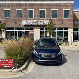 a car parked in front of a building