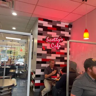 a man sitting at a table eating