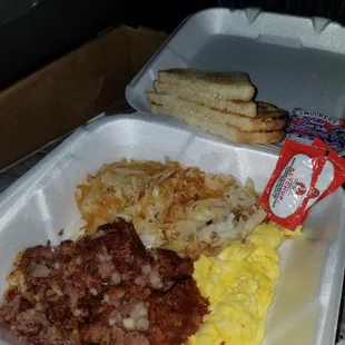 Corned beef &amp; hash plate w/ toast to go.