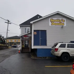 From parking lot behind building