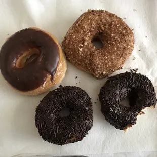 Chocolate glazed, cinnamon, and chocolate sprinkle