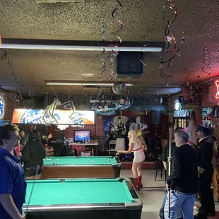people playing pool