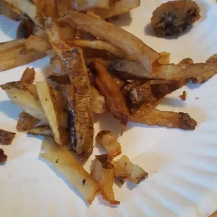 a paper plate of fries