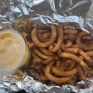 Curly fries with cheese