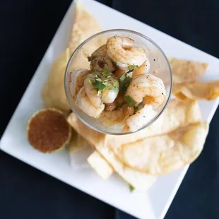 Margarita Shrimp Cocktail - Grilled shrimp drunk on Margaritas nested on pico w/ home made tortilla strips