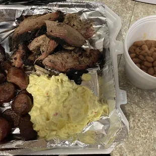 BBQ plate. Brisket, sausage, potato salad &amp; beans