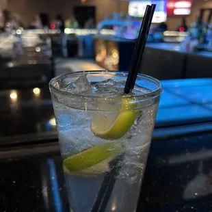 Tito's and soda in a tall with 3 limes!!