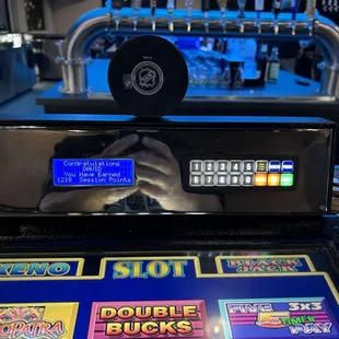 Win the period get the puck. Keep the puck at the end of the game and you get $25 free plays.