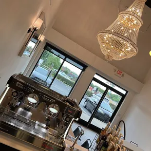 an espresso machine in a coffee shop