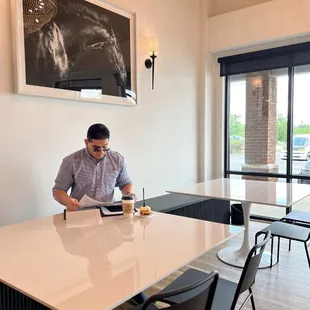 a man sitting at a table