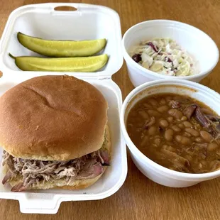 Regular Size Pulled Pork Sandwich with BBQ Beans, Cole Slaw, and Complimentary Pickles