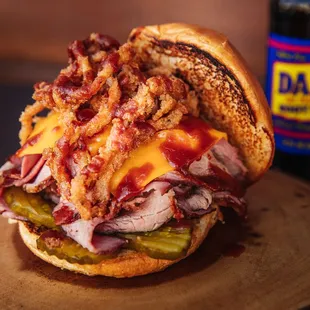 a sandwich with bacon and cheese