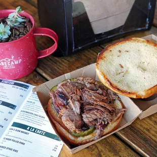 Delicious Air-Plain Sandwich, with brisket! Sweet and tangy BBQ sauce that compliments the flavors so well. Will be back for more!