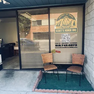 two chairs in front of the door