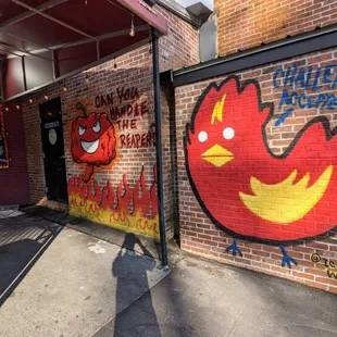 Outside. Storefront. Patio. Hidden from street view. Located behind NaanStop and in the old Lovies BBQ space. Plenty of parking in back.