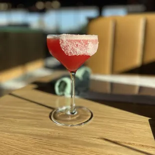 a glass of watermelon on a table