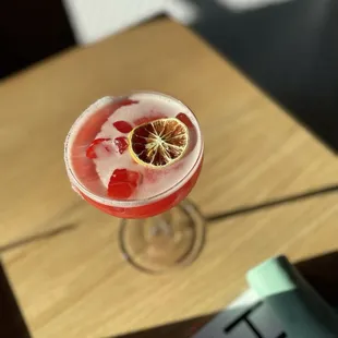 a drink in a wine glass