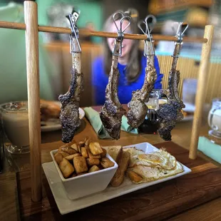 Oaty's lampchops with potatoes, over easy eggs and wheat toast