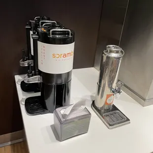 a coffee maker and a beverage dispenser