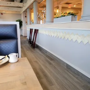 a table with a cup of coffee on it