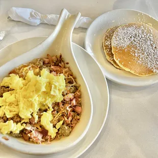 Meat Lovers Skillet w/ a side of pancakes. ($12)