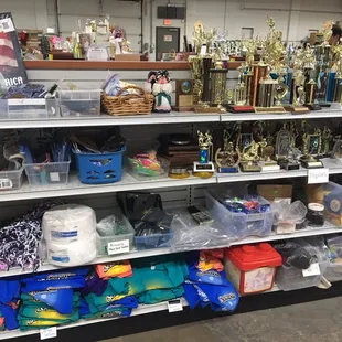 Trophies and and overstock t-shirts
