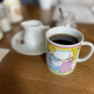 a cup of coffee and saucer