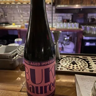 a bottle of beer on a table