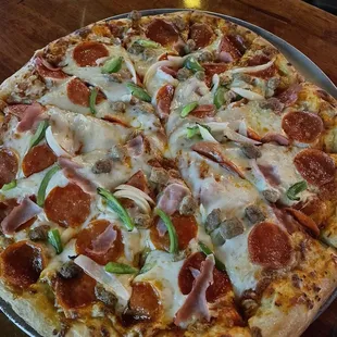 Pepperoni, sausage, mushrooms and onion