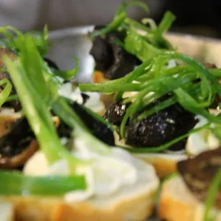 Mushroom and goat cheese mousse crostini