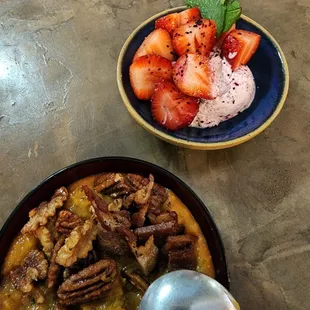 Sweet potato bisque with bacon and candied pecans, and strawberries with chevre