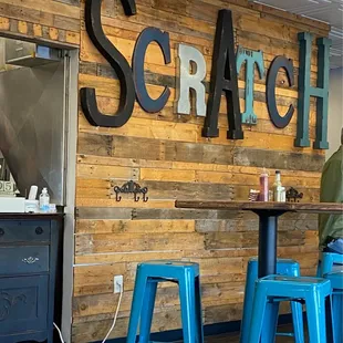 a man sitting at a table in a restaurant