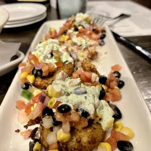 Fried green tomatoes  Served with black bean and corn salsa, with buttermilk herb dressing