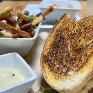 Scratch BLT Candied Bacon, Arugula, Cold-Smoked Green Tomatoes, Korean Mayo. Served on A Lightly Toasted Stick Boy Sourdough Bread.