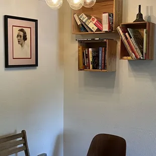 a dining room with a checkered table and chairs